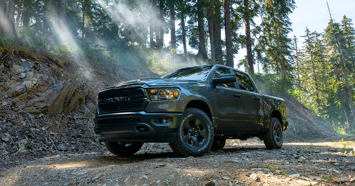 2024 Ram 1500 parked off road on a nature trail.
