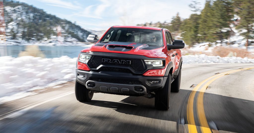 Ram 1500 truck driving through a wintery road